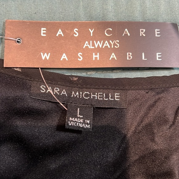 Black with silver polka dots. - Picture 3 of 3